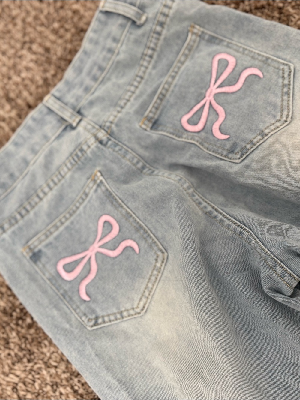 light wash wide leg jeans with embroidered bows - Picture 3 of 3